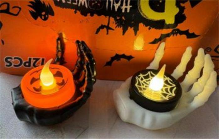 MANO CALAVERA HALLOWEEN C/CANDELA LUZ