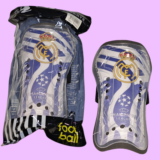 ESPINILLERA TRANSPARENTE REAL